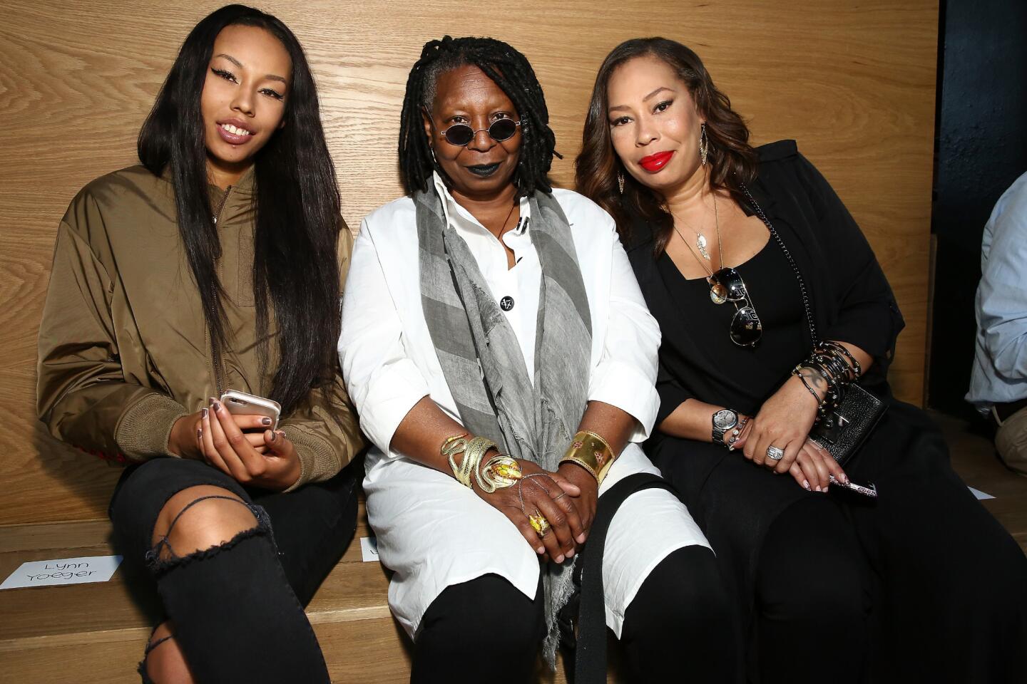 Jerzey Dean, left, Whoopi Goldberg and Alex Martin attend the Gypsy Sport fashion show during New York Fashion Week.