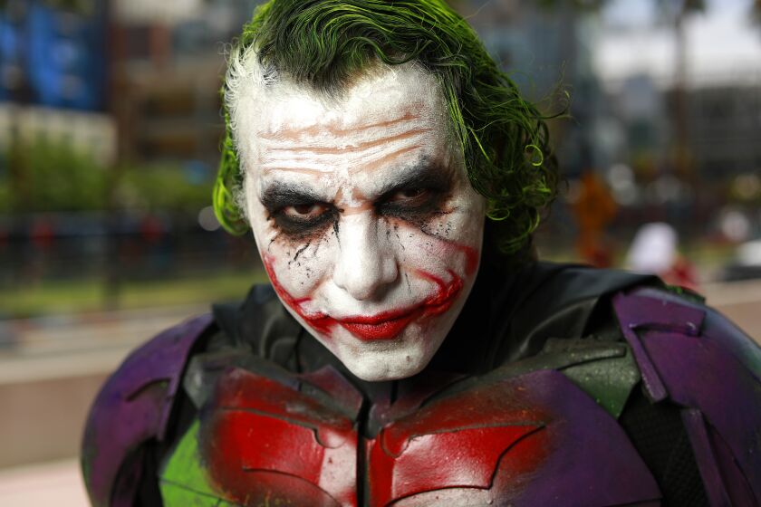 San Diego, CA - JULY 21: Jean Markus of Sao Paulo Brazil dressed as the Joker at Comic-Con in San Diego on Thursday, July 21, 2022. (K.C. Alfred / The San Diego Union-Tribune)