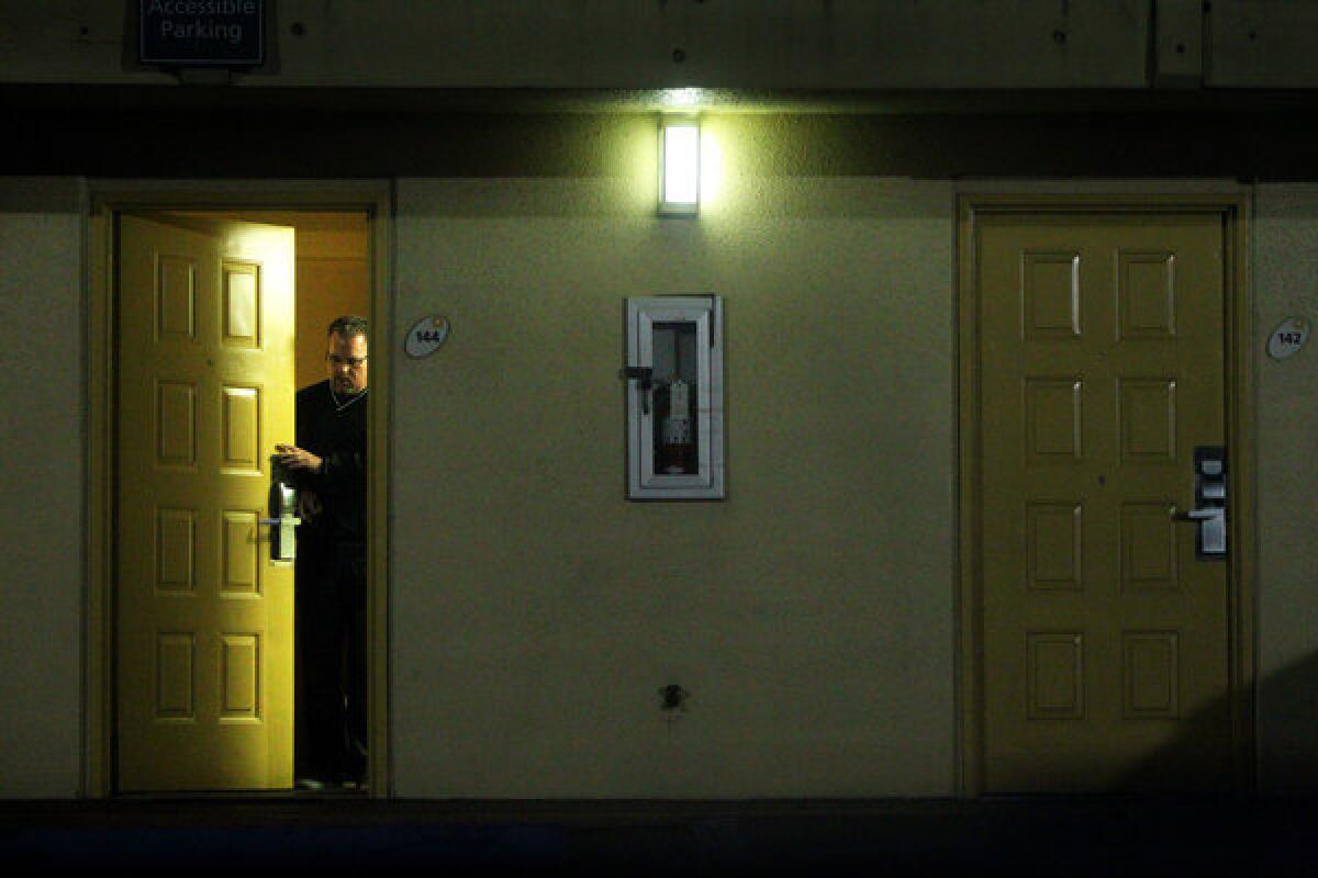 Greg Reese, president of Clear Image Investigations, exits the hotel room of a girl he had contacted through backpage.com. A group of about a dozen people meet every other Friday night to try to reach out to and rescue women engaged in prostitution.
