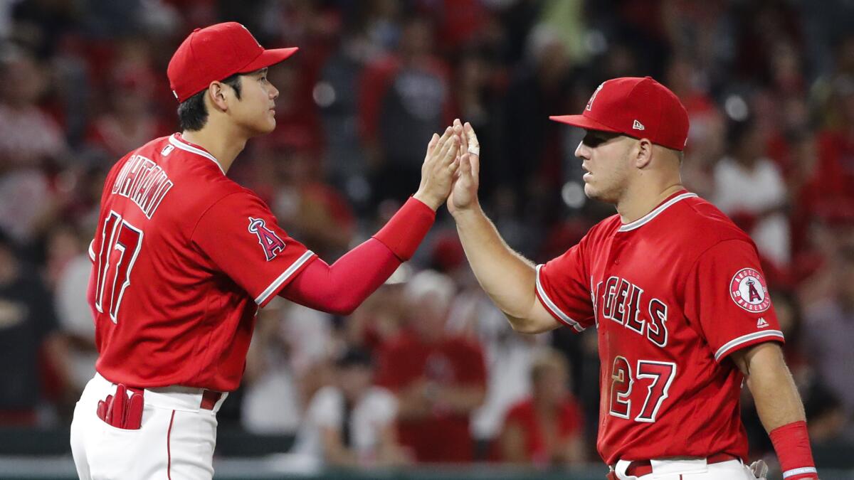 Mike Trout says he'll do whatever he can to keep Shohei Ohtani with the Angels