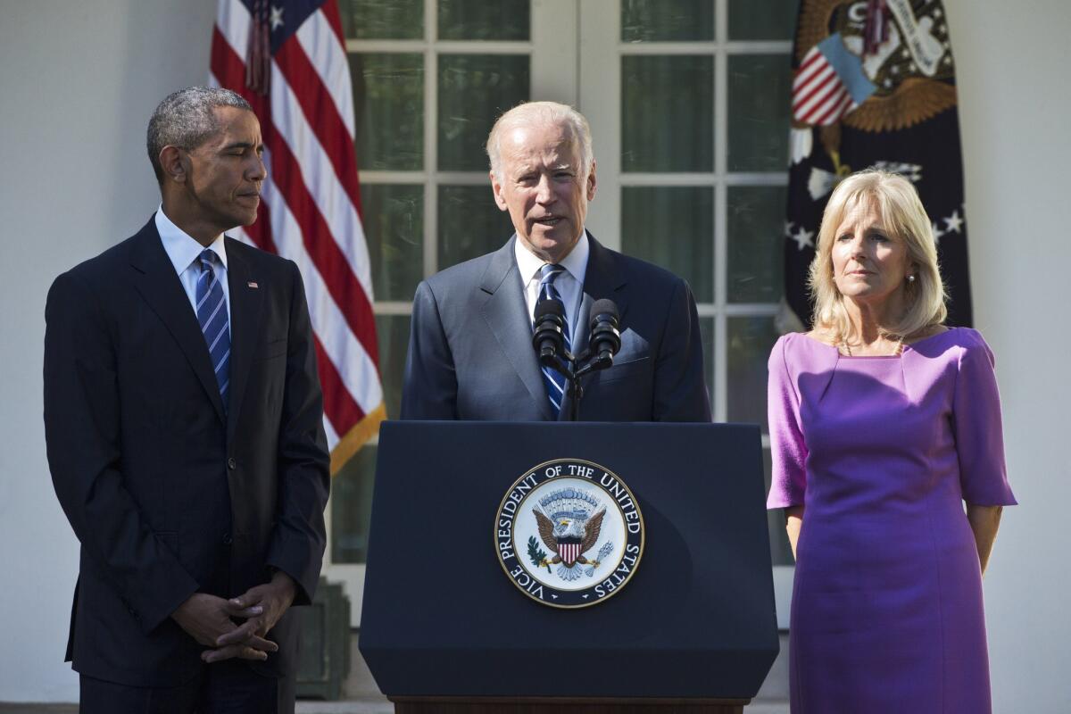 Vice President Joe Biden, accompanied by his wife Jill and President Barack Obama, announces that he will not run for the presidential nomination, Wednesday, Oct. 21, 2015, in the Rose Garden of the White House in Washington. (AP Photo/Jacquelyn Martin)