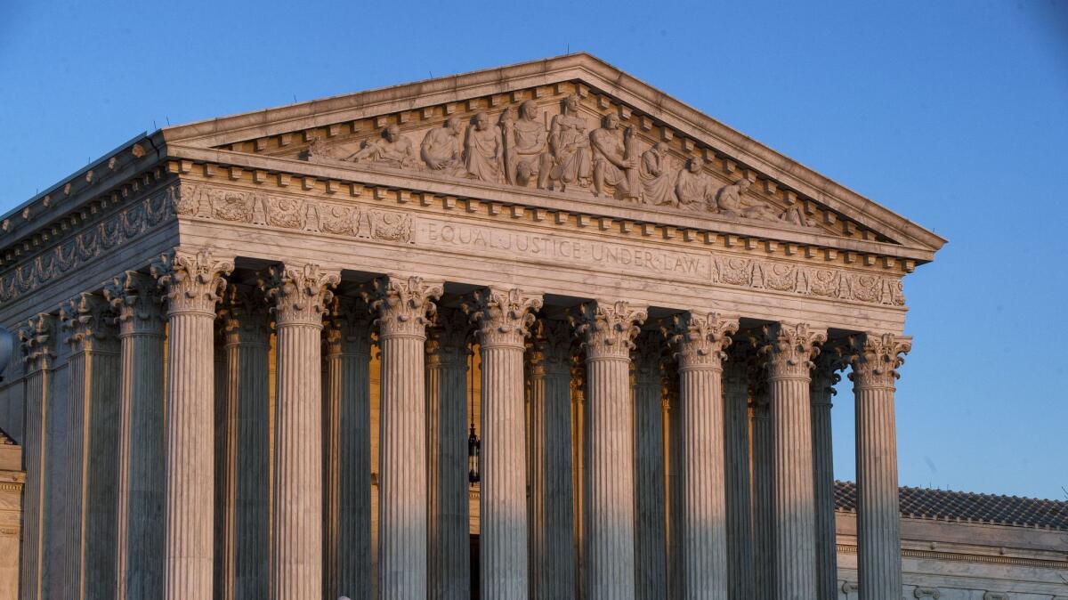 The U.S. Supreme Court building at sunset Wednesday in Washington.