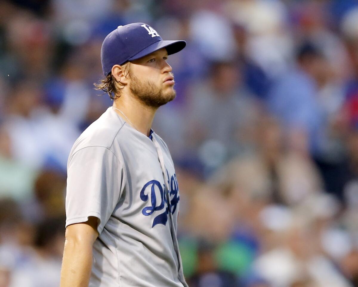 Dodgers pitcher Clayton Kershaw exhales as he returns to the mound during the second inning of a game against the Chicago Cubs on June 22.