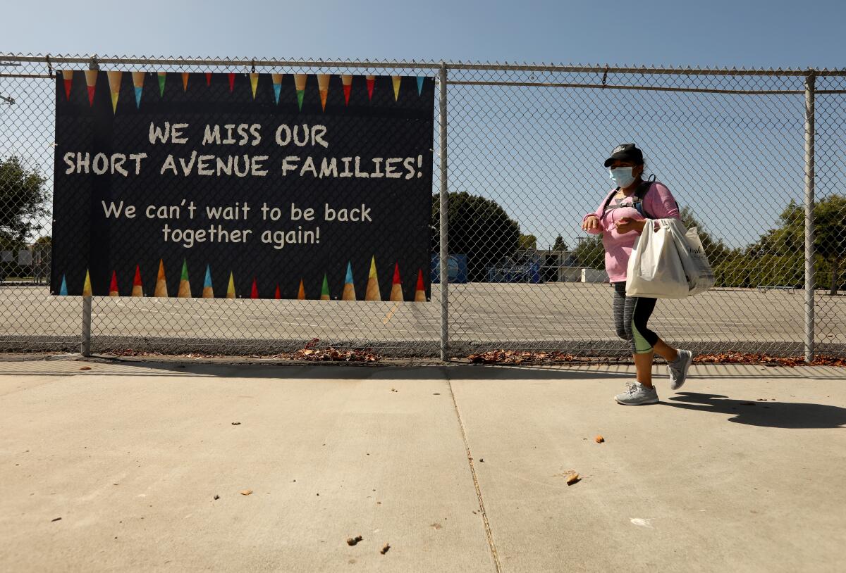  A sign states, "We miss our Short Avenue Families," at the closed Short Avenue Elementary School in Mar Vista.