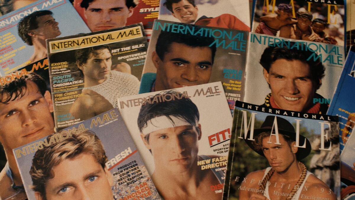 A collection of International Male fashion catalogs.