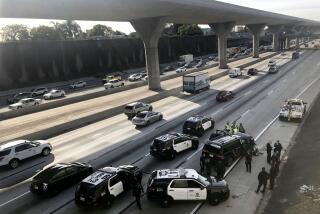 LOS ANGELES CA. FEBRUARY 27, 2020 - An SUV that was carrying a body in a casket and was stolen from a Pasadena church parking lot crashed on the 110 Freeway on Thursday morning during a police pursuit. (Irfan Khan / Los Angeles Times)