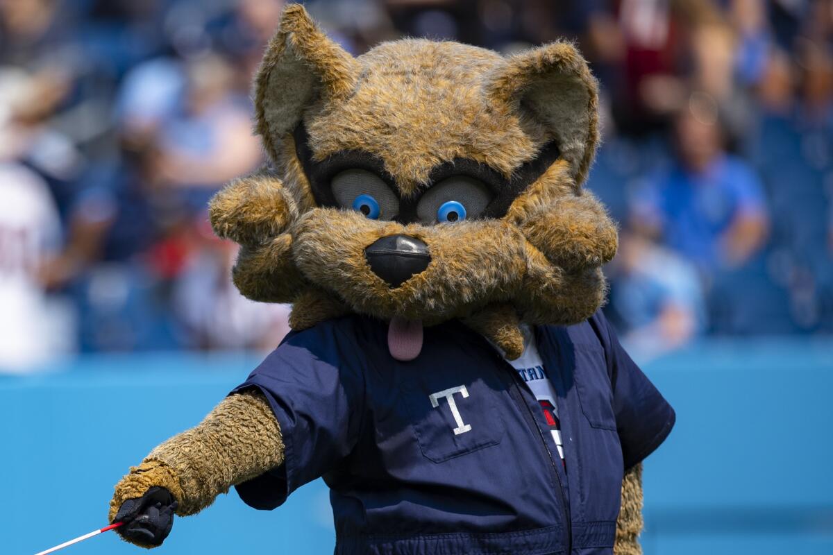 Tennessee Titans mascot T-Rac performs during the first half of an NFL football game
