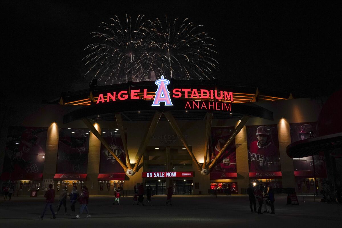 Fireworks burst over Angel Stadium after a baseball game.