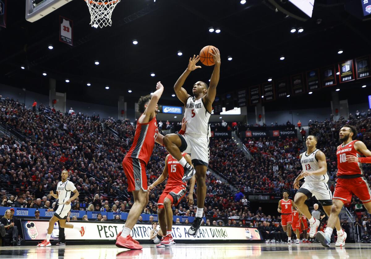 San Diego State's Lamont Butler scored after a steal against New Mexico.
