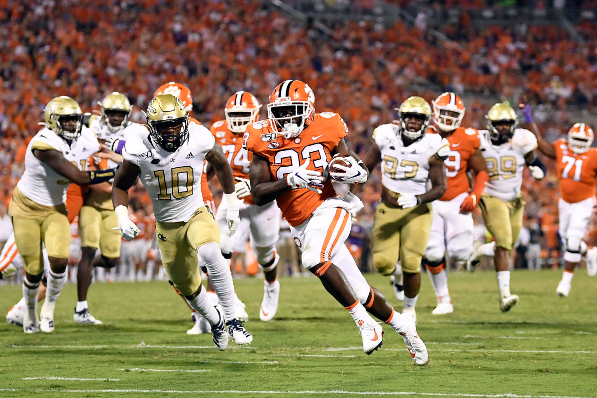 Clemson running back Lyn-J Dixon rushes for a touchdown against Georgia in August 2019.