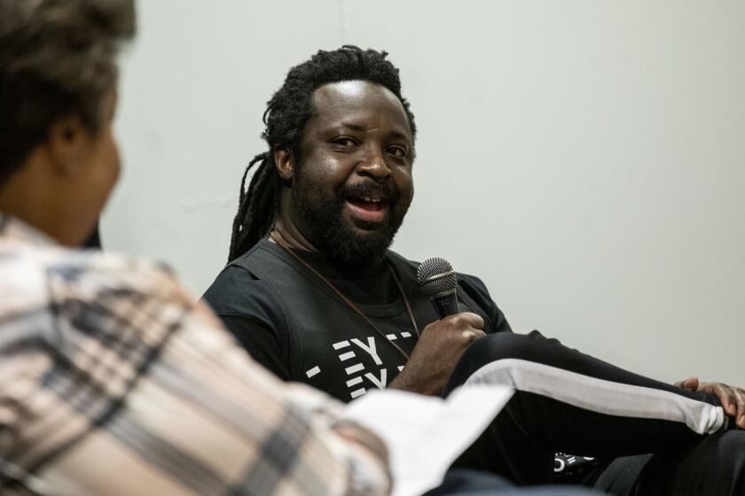 LOS ANGELES, CA --FEBRUARY 20, 2019 --Author Marlon James, right, with writer and editor Roxanne Gay, discussing James? latest book ?Black Leopard, Red Wolf,? at the Museum of African American Art in Los Angeles, CA, Feb 20, 2019. (Jay L. Clendenin / Los Angeles Times)