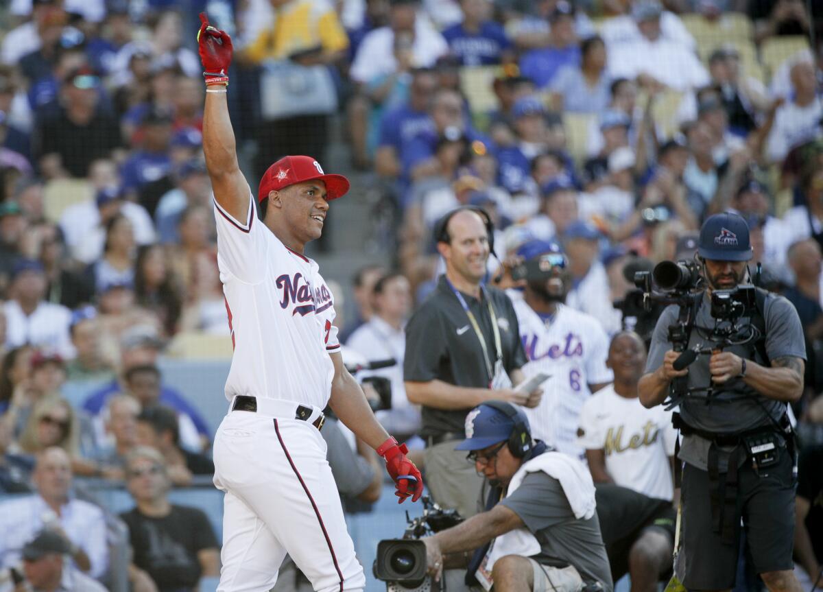 Washington Nationals star Juan Soto celebrates after his first-round victory at the MLB All-Star Home Run Derby.