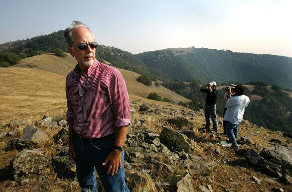 Barry Zoeller, director of communications for the Tejon Ranch Co. stands on a ridge during a recent tour.
