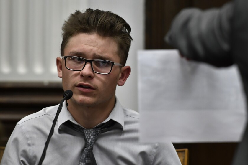FILE - Dominick Black testifies during Kyle Rittenhouse's trial at the Kenosha County Courthouse in Kenosha, Wis, on Nov. 2, 2021. Black, who bought an AR-15-style rifle for Kyle Rittenhouse has pleaded no contest to a reduced charge of contributing to the delinquency of a minor in a deal with prosecutors to avoid prison. A Wisconsin judge accepted Dominick Black's plea on Monday, Jan. 10, 2022. (Sean Krajacic/The Kenosha News via AP, Pool File)
