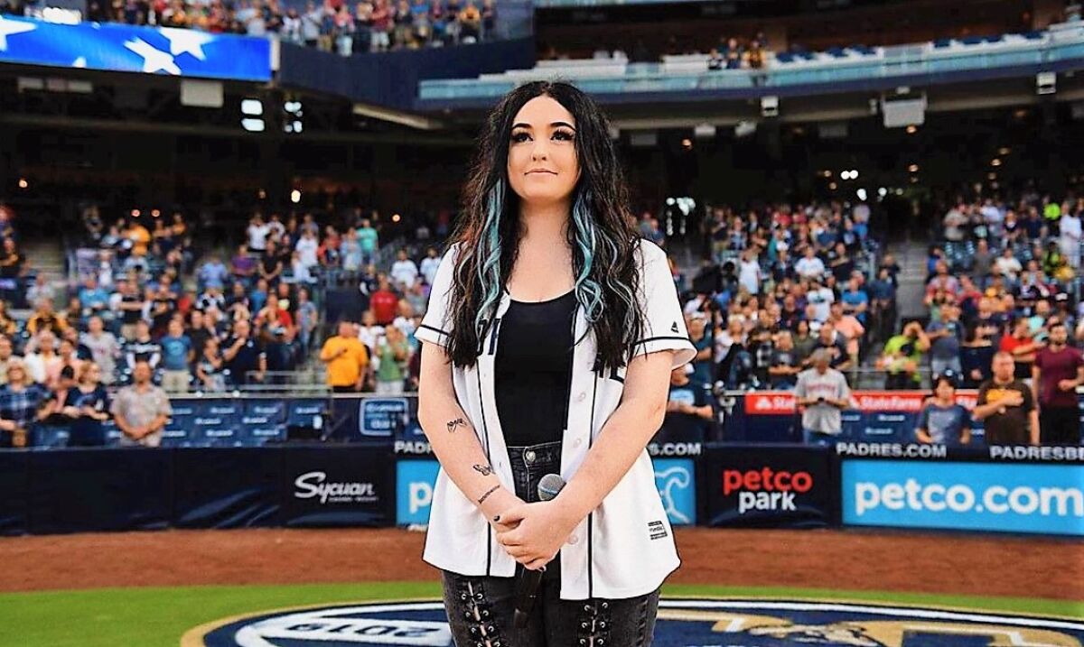 Local singer/songwriter Kendra Checketts sang the national anthem at a Petco Park Padres game against the Red Sox this past season.