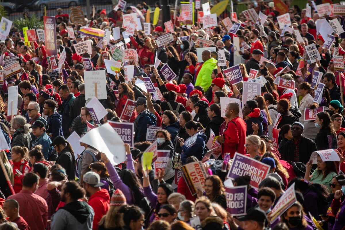 Thousands of people gather at a rally in Grand Park in front of City Hall in Los Angeles on Wednesday.