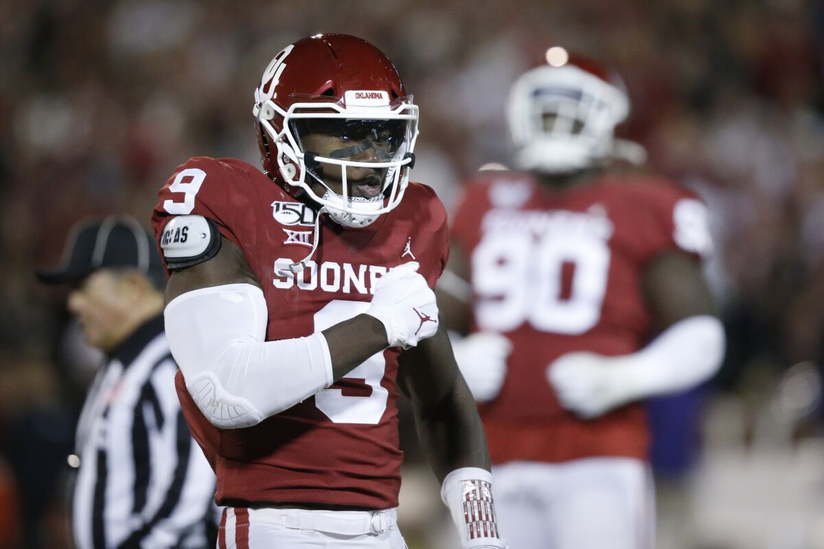 Oklahoma linebacker Kenneth Murray (9) celebrates a tackle during game against TCU in November in Norman, Okla.