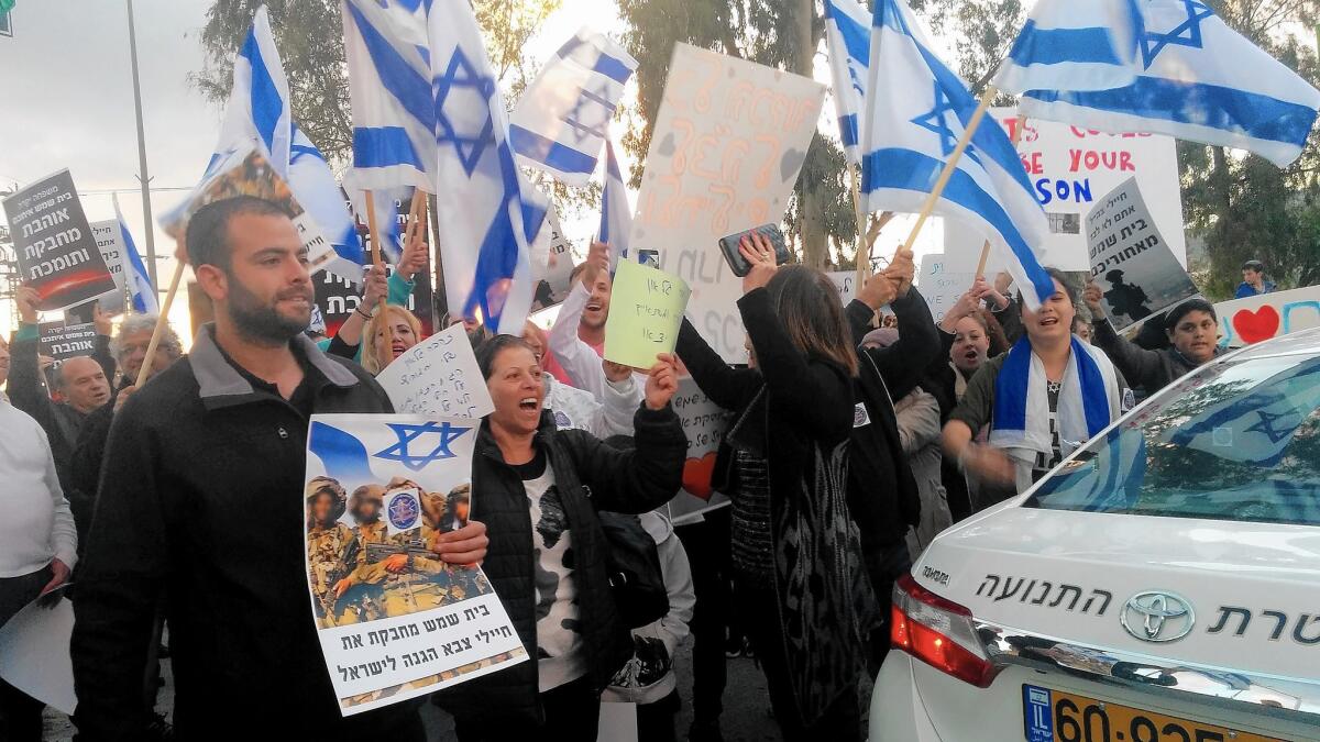 Israelis in Beit Shemesh show solidarity with a soldier facing court-martial in the shooting death of a Palestinian knife assailant.