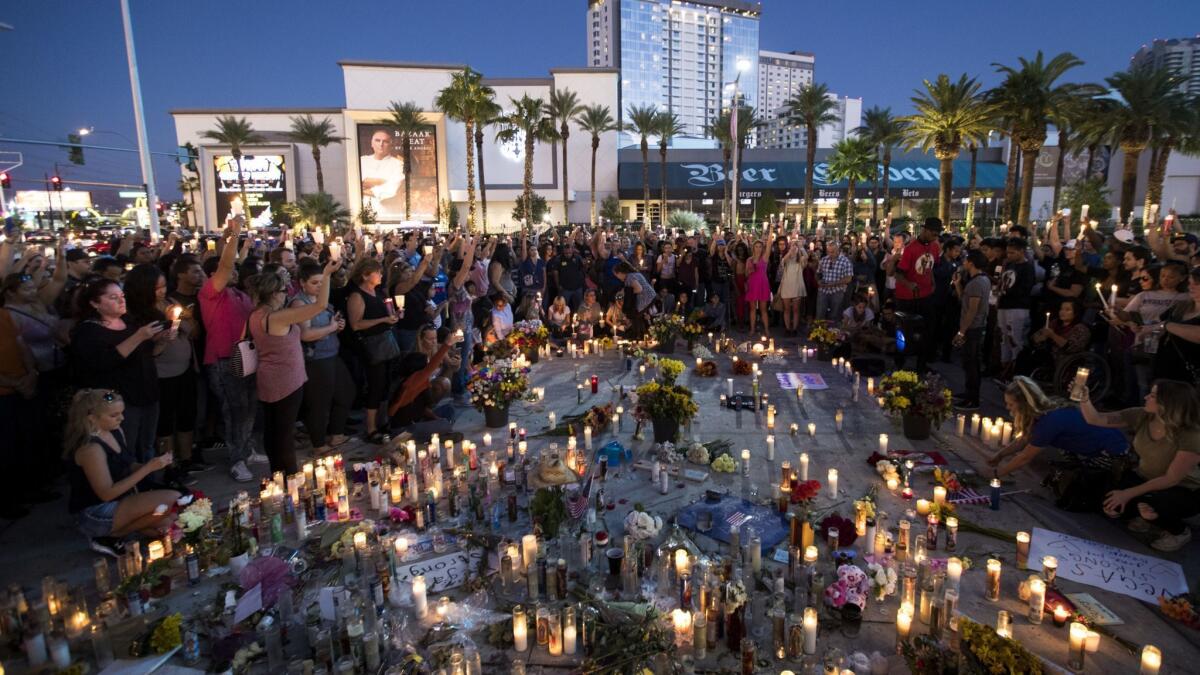 Days after the deadly Las Vegas shooting, mourners gather along the Vegas Strip.