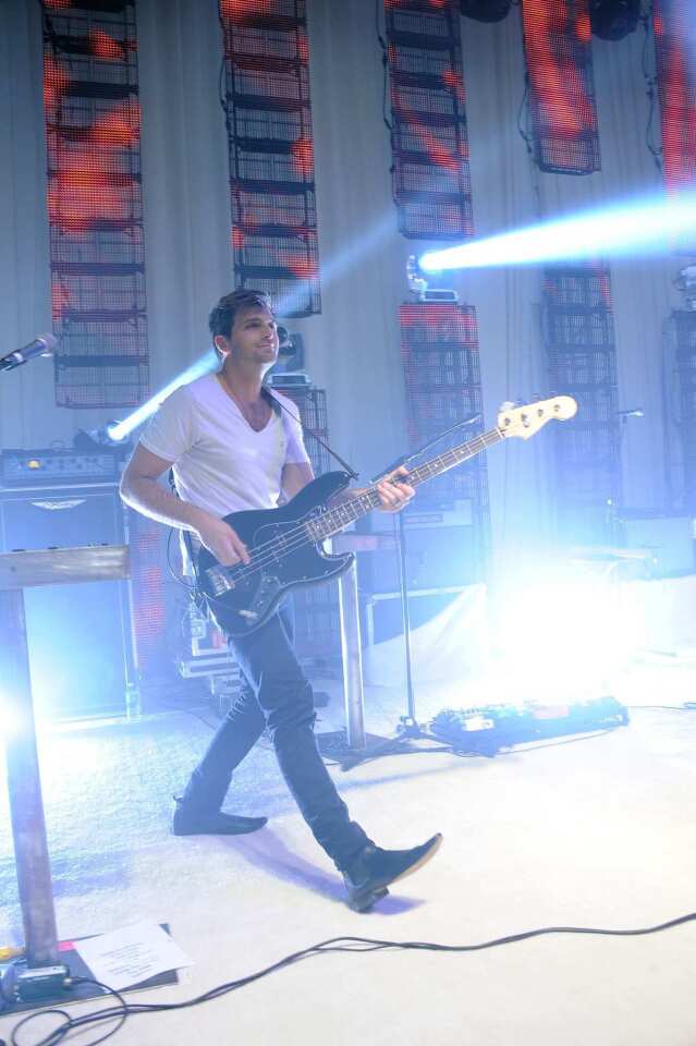 Musician Cubbie Fink performs on stage during the party.