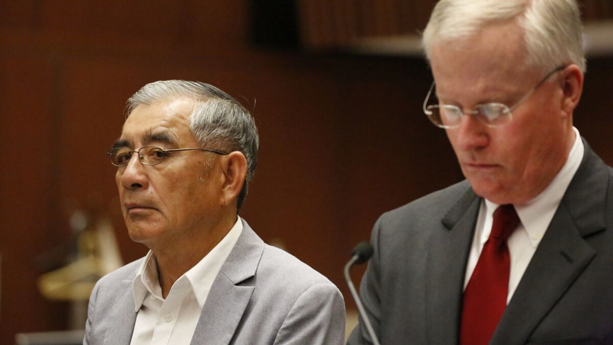 Samuel Leung, left, with his lawyer, Daniel V. Nixon, during an April appearance in Los Angeles Superior Court.