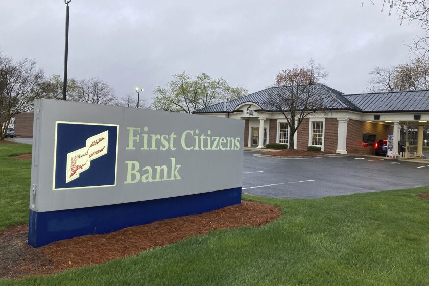 A First Citizens Bank sign is seen in Durham, North Carolina, on Monday March 27, 2023. North Carolina-based First Citizens will buy Silicon Valley Bank, the tech industry-focused financial institution that collapsed earlier this month. (AP Photo/Jonathan Drew)