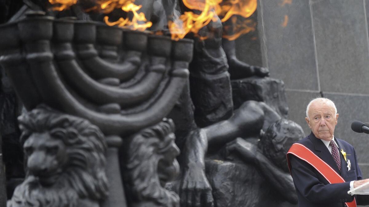 Simcha Rotem speaks in front of the Warsaw Ghetto Uprising memorial during the revolt anniversary ceremonies in Warsaw on April 19, 2013.