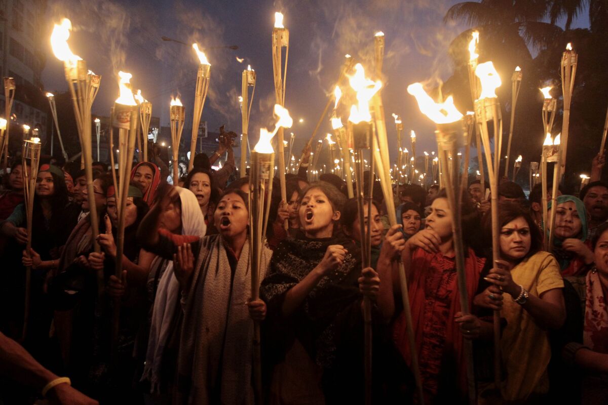 Bangladeshi activists at a torch rally in Dhaka on Thursday night, celebrating the Supreme Court's refusal to consider an appeal of the death sentence handed to opposition political leader Abdul Quader Mollah for alleged war crimes in the 1971 independence battle.