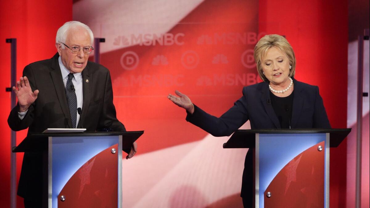 Sen. Bernie Sanders and Hillary Clinton spar during a Democratic presidential primary debate hosted by MSNBC at the University of New Hampshire in Durham, N.H., on Feb. 4, 2016.