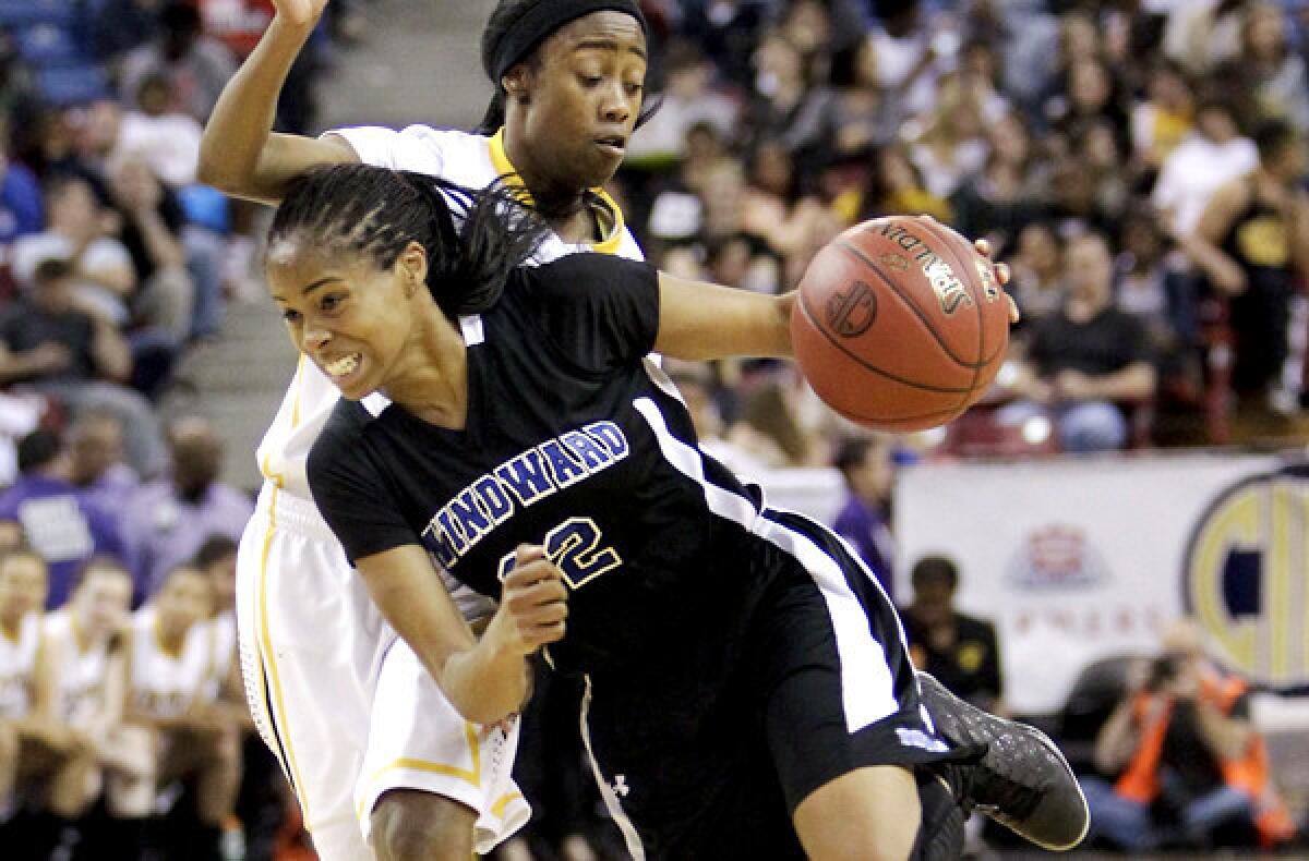Windward guard Jordin Canada drives against Bishop O'Dowd guard Troye Mosley during a state playoff game last spring.