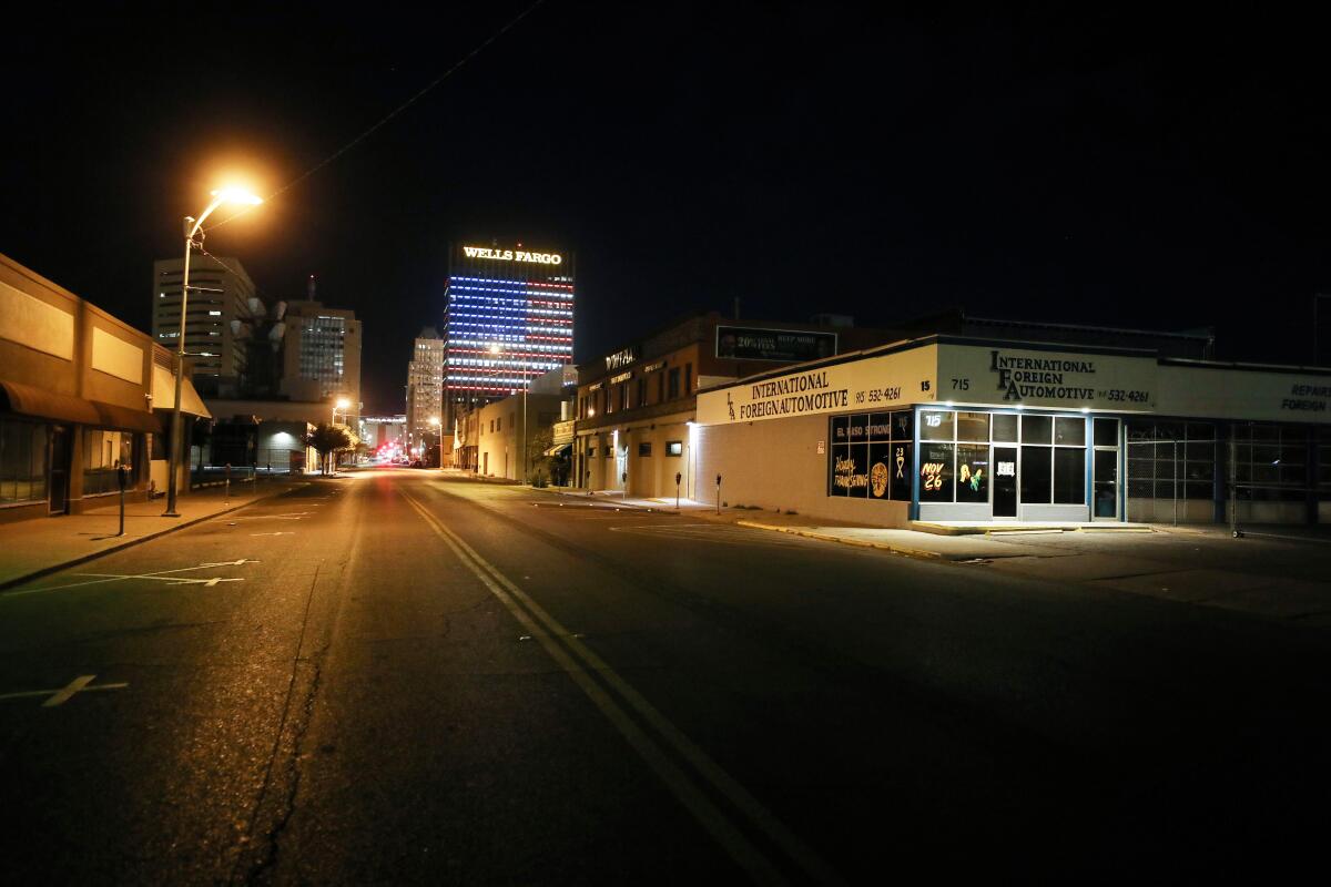 Wells Fargo Plaza in downtown El Paso is lit with an American flag design.