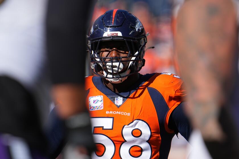 Denver Broncos outside linebacker Von Miller (58) reacts to a play.