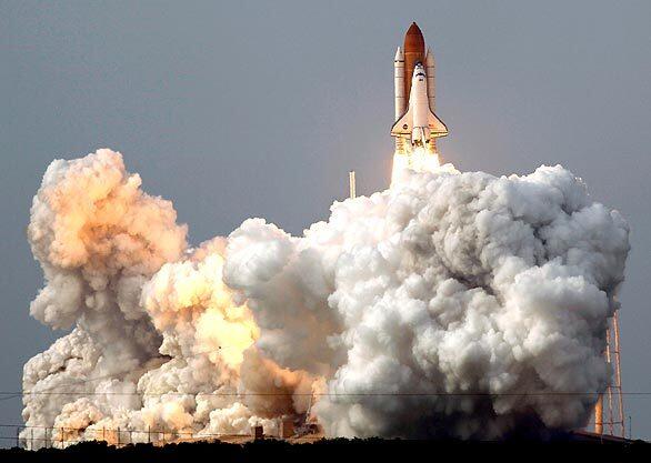 The space shuttle Endeavour lifts off from Kennedy Space Center in Florida. The Endeavour mission, delayed more than a month because of weather and technical problems, will deliver components for Japan's Kibo laboratory to the International Space Station.