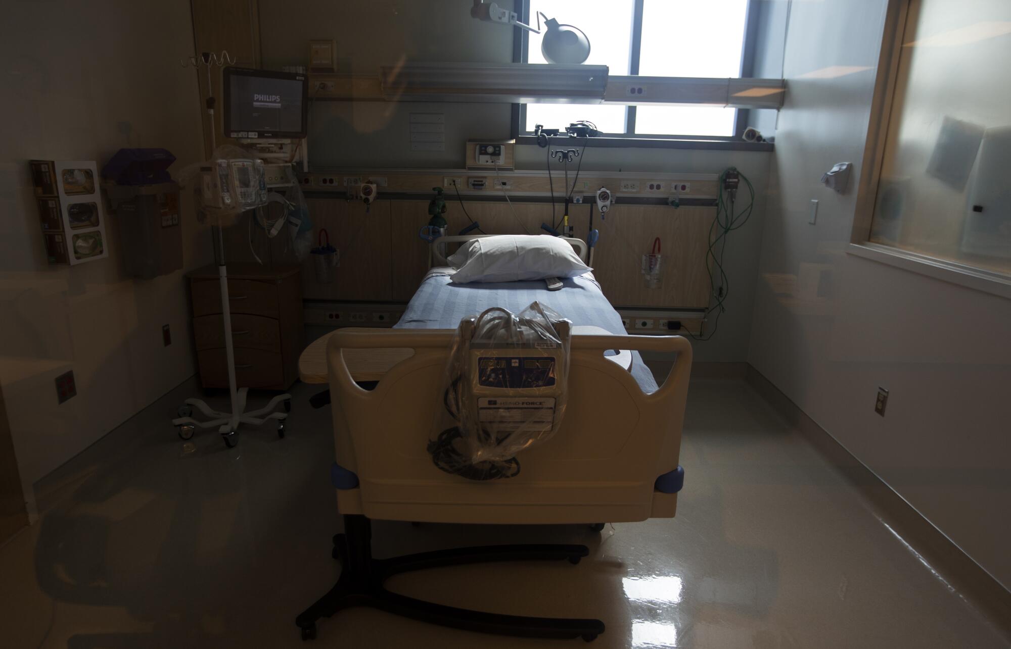 An empty hospital bed.