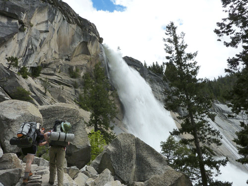 Backpackers heading up the switchbacks near Nevada Fall in early June.