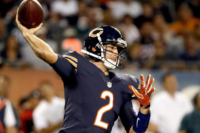 Bears backup quarterback Brian Hoyer attempts a pass against the Eagles on Monday in relief of injured starter Jay Cutler.