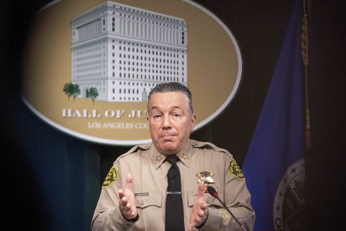 Los Angeles County Sheriff Alex Villanueva holds a news conference on a week-long statewide operation aimed at combatting human trafficking, on Tuesday, Feb. 15, 2022 in Los Angeles. (Sarah Reingewirtz/The Orange County Register via AP)