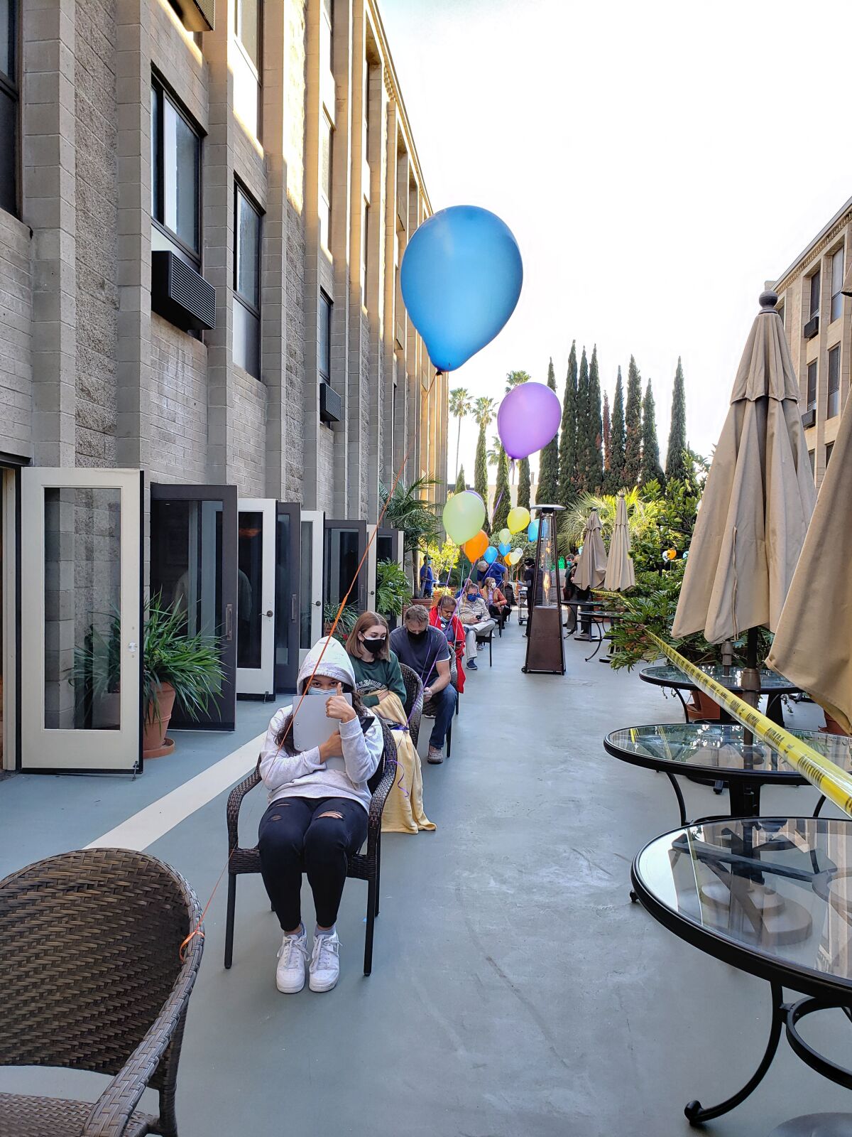 Chateau La Jolla residents and staff members wait to get their COVID-19 vaccinations Jan. 27.