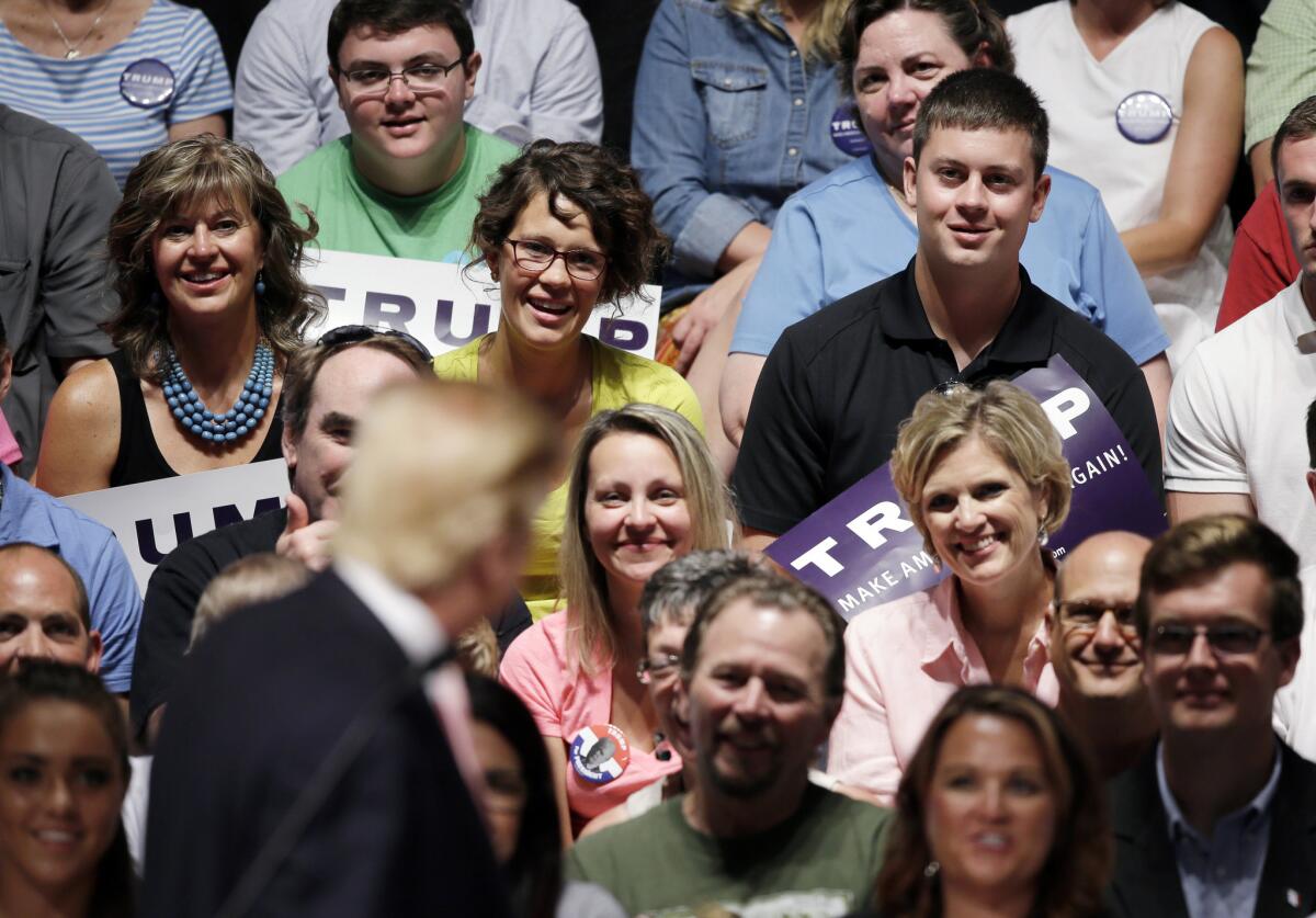 A crowd listens as Republican presidential candidate Donald Trump speaks at a rally and picnic in Oskaloosa, Iowa, in late July.