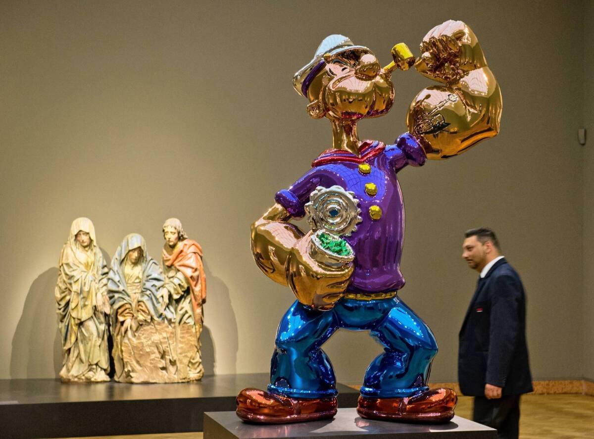 This colorful Popeye is not the Sailor Man in question but is another by artist Jeff Koons.
