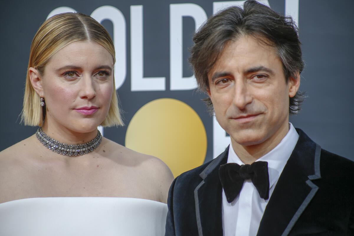 A close-up of Greta Gerwig and Noah Baumbach in formalwear