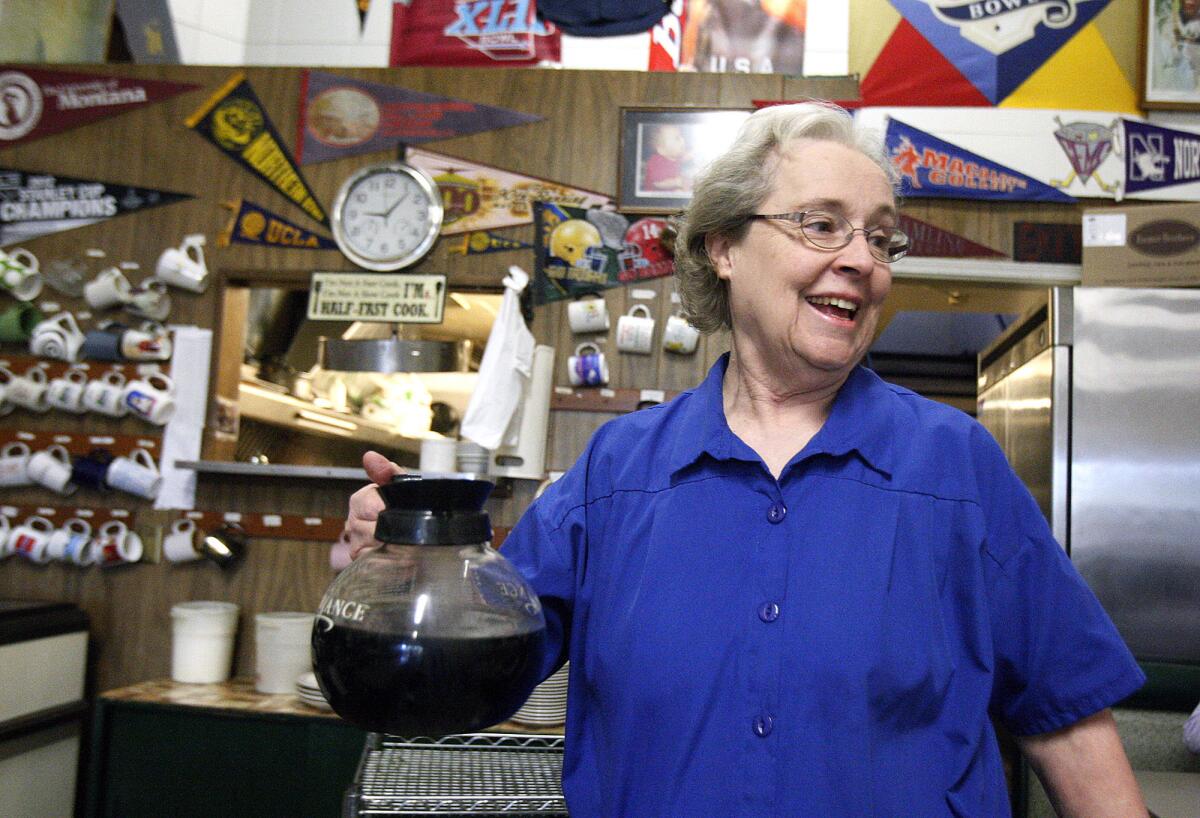 Wanda Bergstrom, with a pot of coffee that she says is an extension of her arm, at City Hall Coffee Shop in Montrose where Bergstrom has worked for more than four decades, pictured on Monday, January 6, 2014.