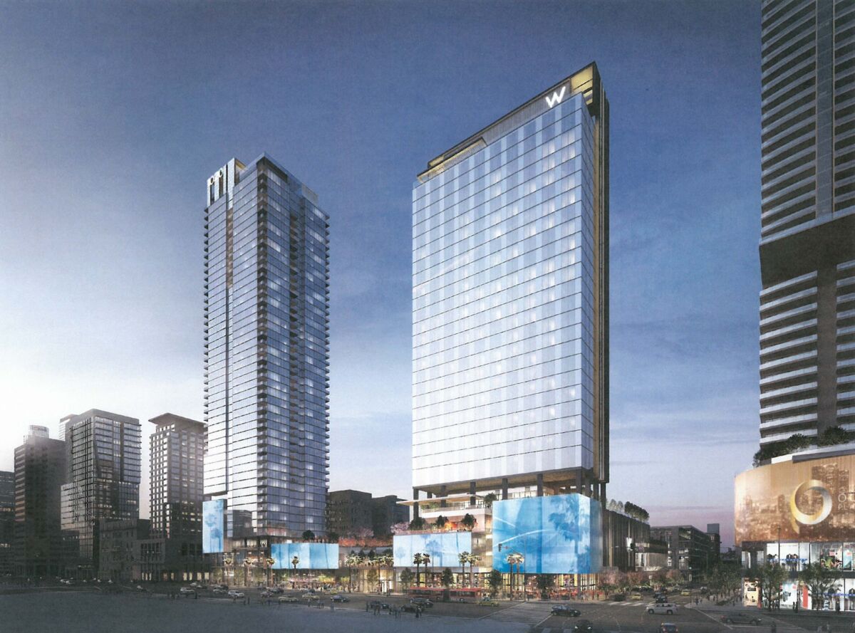 A rendering of a planned project shows two towers in downtown L.A.