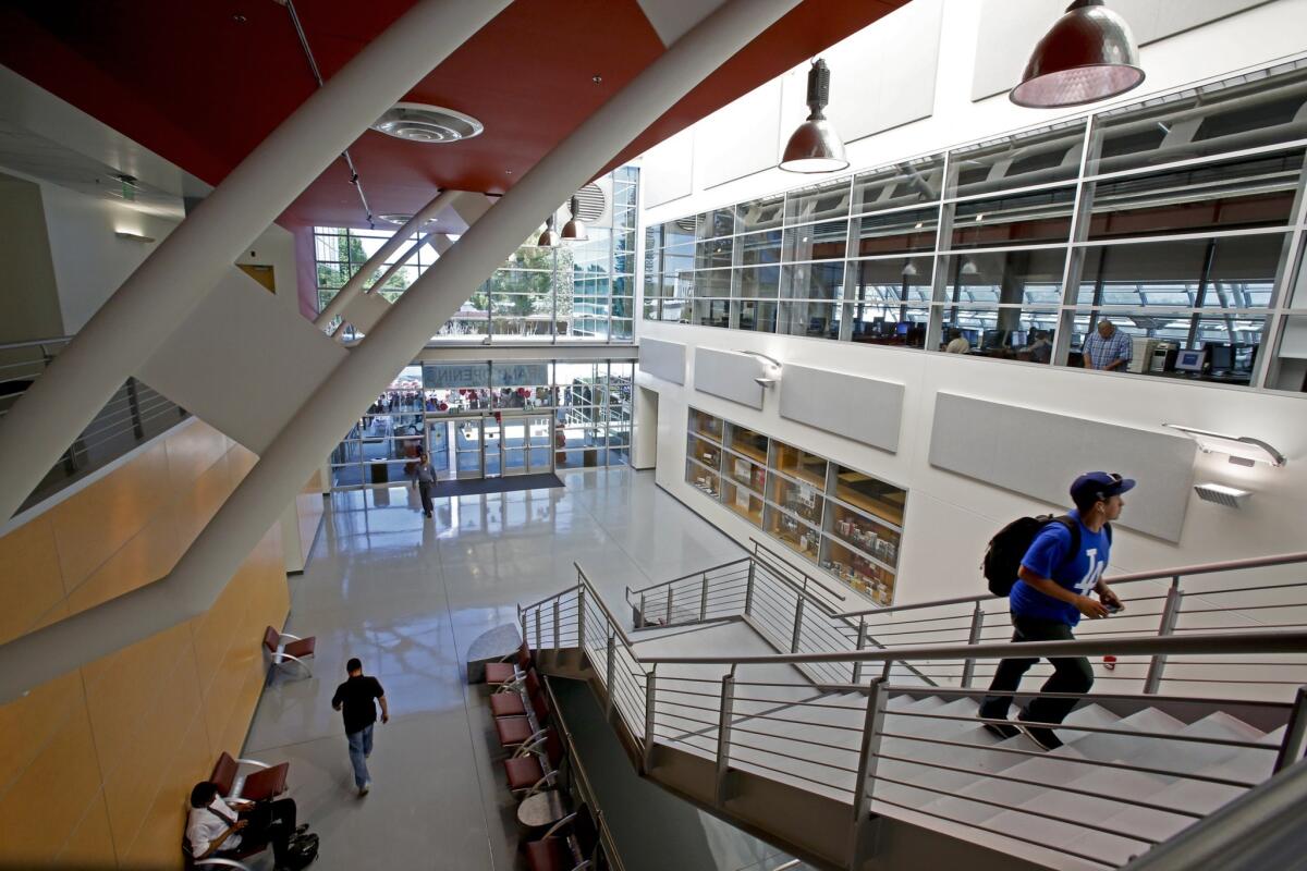 A $25-million library opened on the Compton Community College campus in 2014 after a seven-year delay. Accreditation leaders said the new building was symbolic of the progress the school has made in recent years.