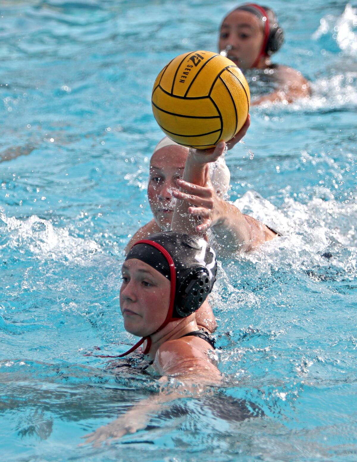 Flintridge Sacred Heart Academy water polo player Audry Lawlor attempts a shot on goal in home game vs. Marymount, in La Canada Flintridge on Thursday, Jan. 30, 2020.