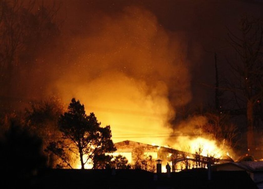 A massive fire roars through a mostly residential neighborhood in San Bruno, Calif., Thursday, Sept. 9, 2010. Firefighters from San Bruno and surrounding cities are battling the blaze that started on a hillside and is now consuming homes in a residential neighborhood. (AP Photo/Paul Sakuma)