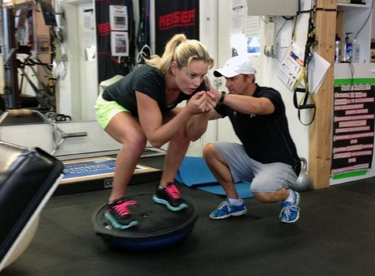 Lindsey Vonn works out with coach Martin Hager on Wednesday.