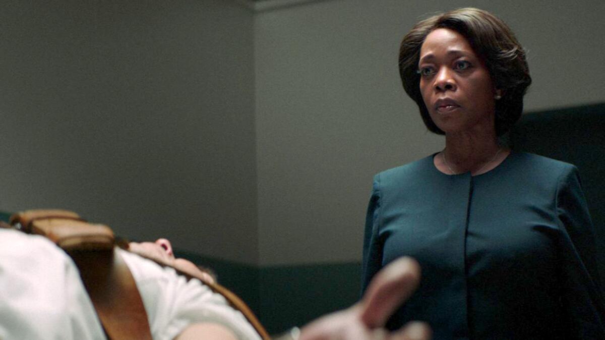 Alfre Woodard and Alex Castillo in the movie "Clemency." 