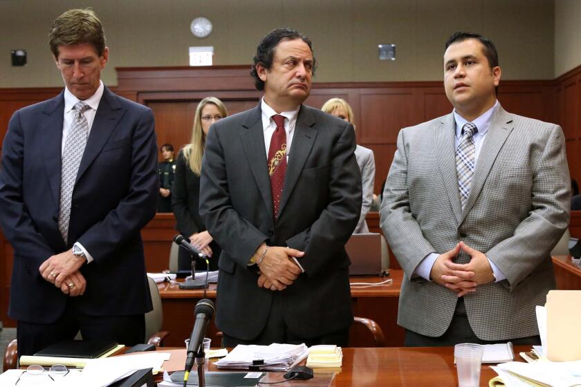 George Zimmerman answers questions from Judge Debra Nelson, with defense attorney Mark O'Mara and jury consultant Robert Hirschhorn (center), in Seminole circuit court on the 6th day of the Zimmerman trial, in Sanford, Fla., Monday, June 17, 2013. Zimmerman is accused in the fatal shooting of Trayvon Martin. (Joe Burbank/Orlando Sentinel) newsgate CCI B582997700Z.1