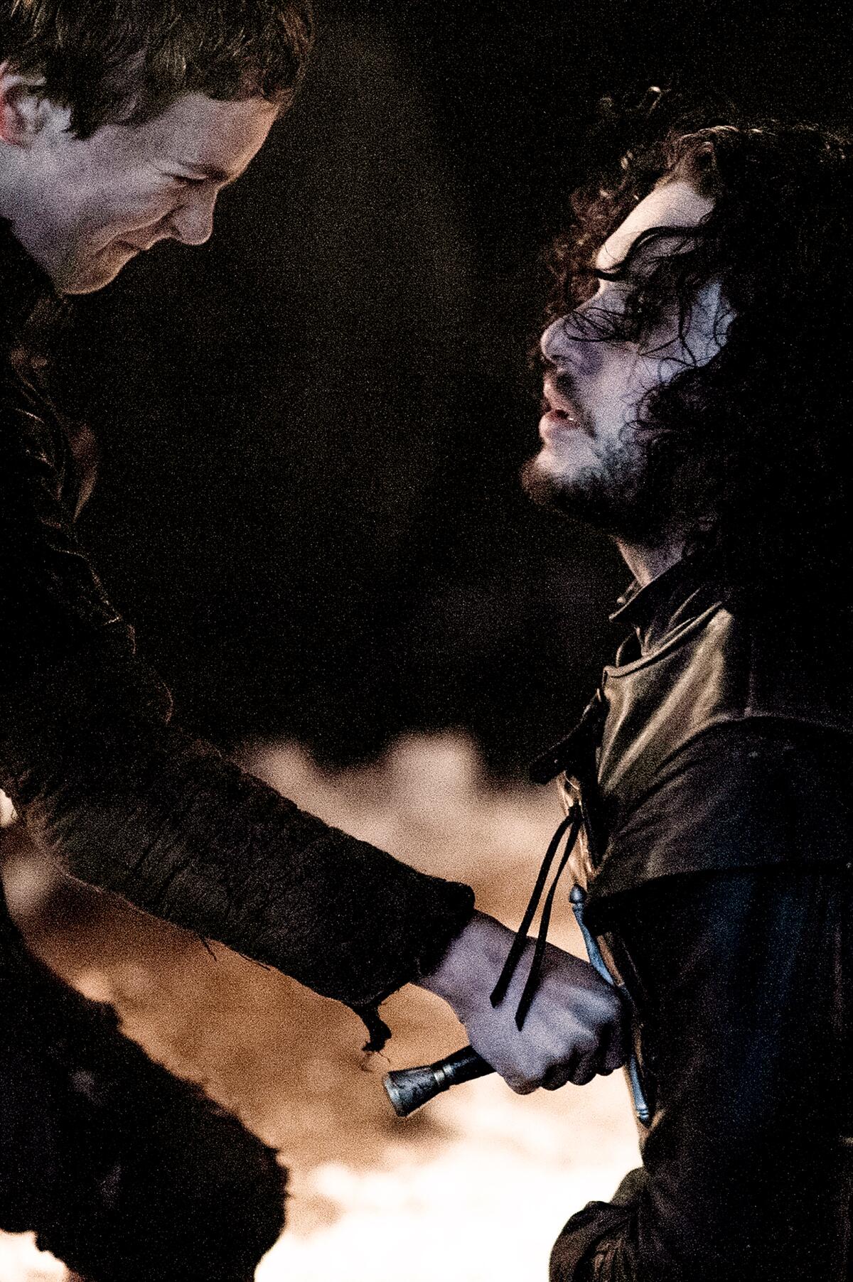Brenock O'Connor's Olly stabs Kit Harington's Jon Snow in "Game of Thrones."